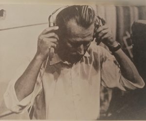 George Martin checking the mix in the cans