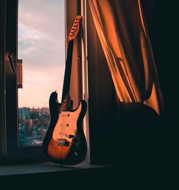 guitar behind the curtain