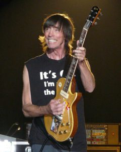 Tom Scholz playing a guitar solo
